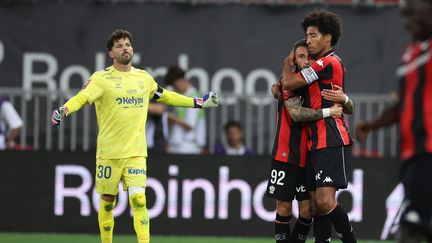 Nice players celebrate after securing Ligue 1 survival against Saint-Étienne