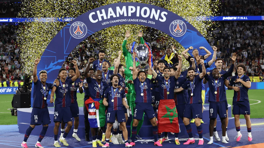 PSG players lift the Champions League trophy for the second consecutive year