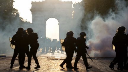 CRS police officers on the Champs-Élysées during PSG’s Champions League celebrations in Paris, May 30, 2026