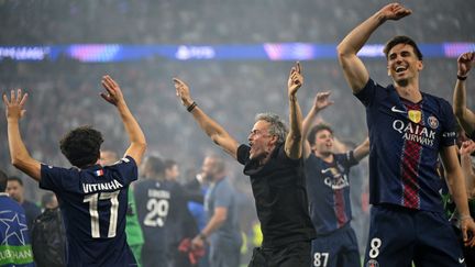 PSG manager Luis Enrique and his players celebrate after defeating Arsenal in the Champions League final, May 30 2026, Budapest