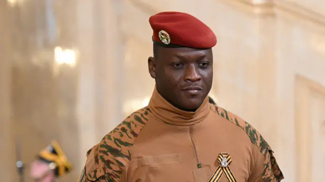 Ibrahim Traoré, Burkina Faso's military leader, in a red beret and military uniform.