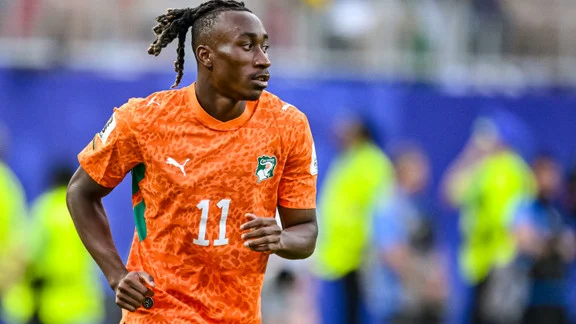 Portrait of Yan Diomandé in football gear