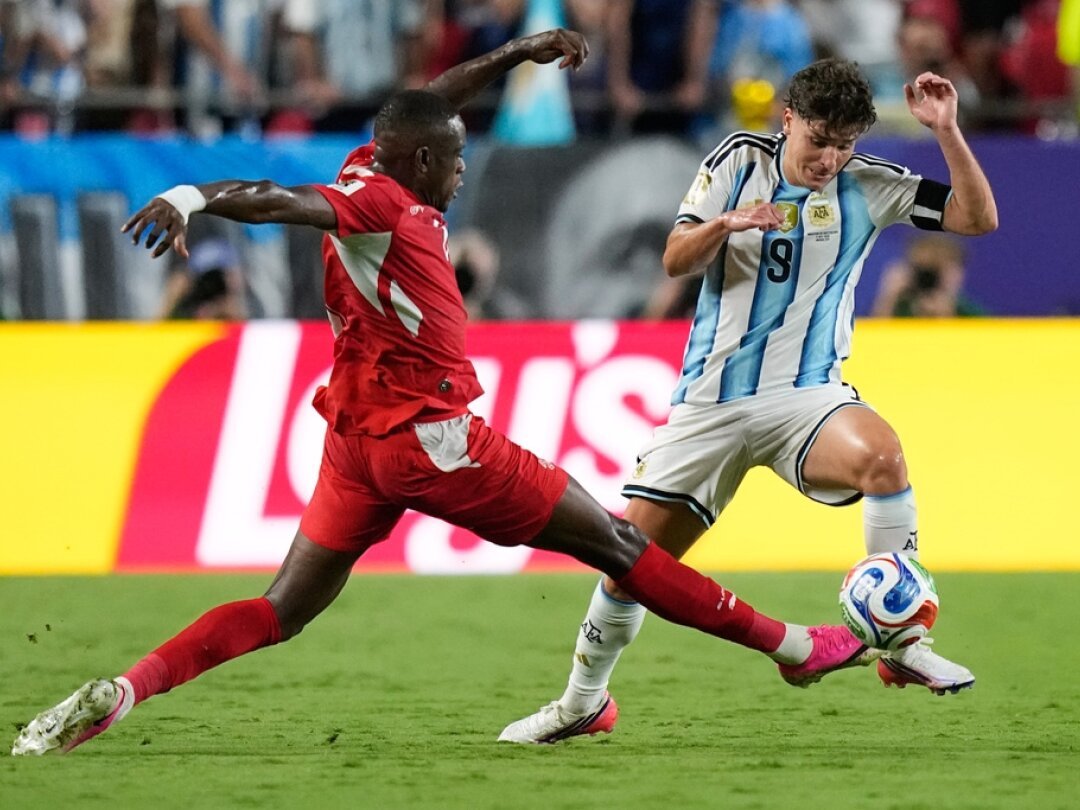 Julian Alvarez celebrates after scoring the decisive second goal for Argentina in extra time.
