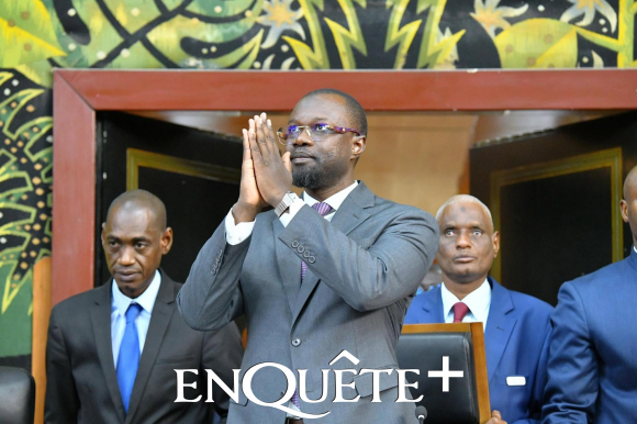 Ousmane Sonko seated at the National Assembly podium in Senegal