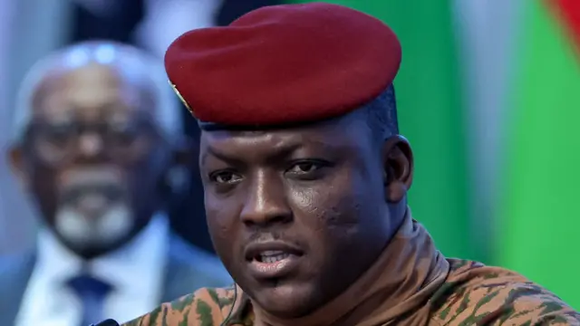 Captain Ibrahim Traoré in a military uniform with a red beret