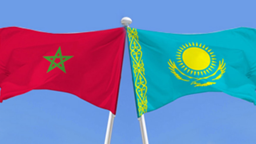 Kazakhstan and Morocco representatives shaking hands during trade talks