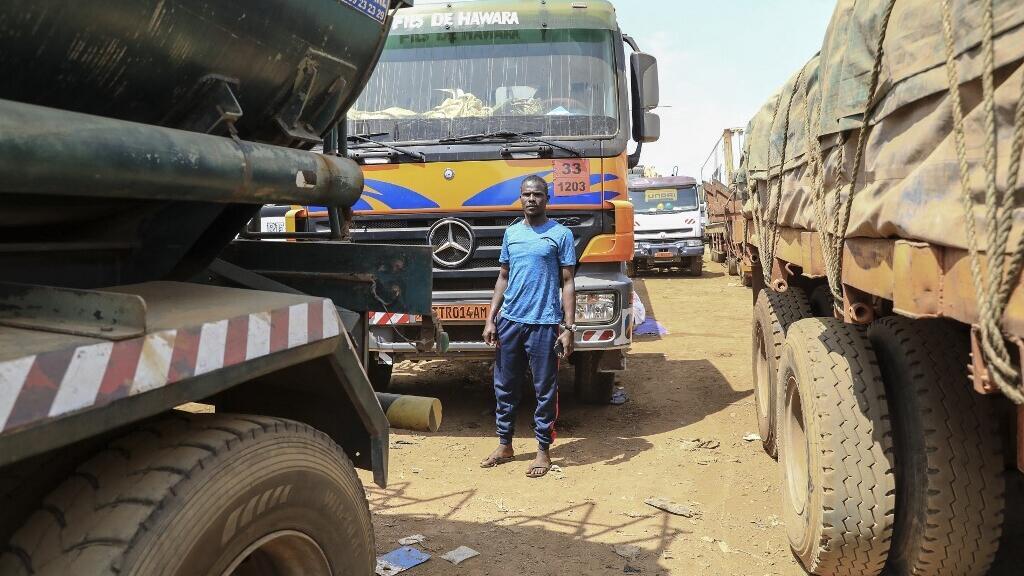 Trucks queued on the main road connecting Bangui in the Central African Republic to Douala in Cameroon (illustrative image).