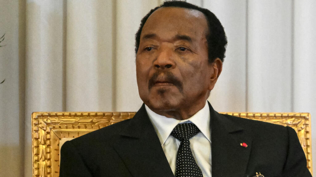 Cameroon's President Paul Biya listens as Pope Leo XIV speaks at the presidential palace in Yaoundé during an 11-day apostolic visit to Africa on April 15, 2026.